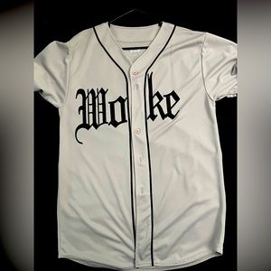 Medium “WOKE” button down jersey type. Never been worn.